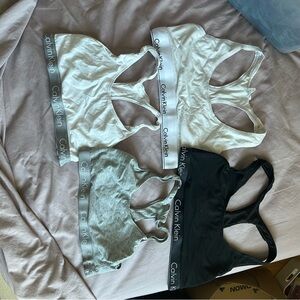 Calvin Klein 4-Pack Racerback Logo Bralettes - White, Gray, Black